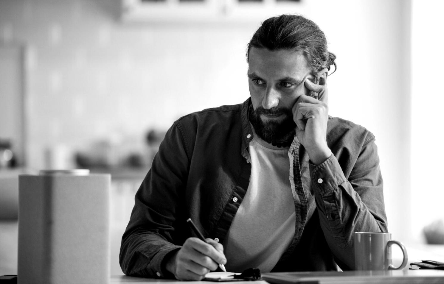 Financial planning workshop session with participants reviewing budget strategies